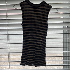 A striped black and white long turtleneck shirt